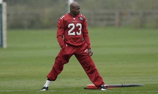 Arizona Cardinals running back Adrian Peterson takes part an NFL training session at the London Iri...