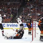 Anaheim Ducks goalie John Gibson (36) reacts after a goal by Arizona Coyotes center Clayton Keller, back, as center Derek Stepan (21) celebrates while defenseman Josh Manson (42) and defenseman Cam Fowler (4) look on during the first period of an NHL hockey game in Anaheim, Calif., Thursday, Oct. 5, 2017. (AP Photo/Kelvin Kuo)
