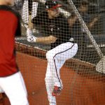 Arizona Diamondbacks center fielder A.J. Pollock hits during a workout at Chase Field, Tuesday, Oct. 3, 2017, in Phoenix, as the team gets ready for a National League wild card playoff baseball game. The Diamondbacks host the Colorado Rockies on Wednesday. (AP Photo/Matt York)