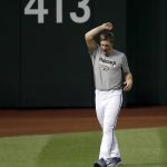 Arizona Diamondbacks starting pitcher Zack Greinke stretches during a workout at Chase Field, Tuesday, Oct. 3, 2017, in Phoenix, as the team gets ready for a National League wild card playoff baseball game. The Diamondbacks host the Colorado Rockies on Wednesday. (AP Photo/Matt York)