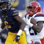 Arizona running back J.J. Taylor (21) runs for a touchdown past California safety Demetrius Flannigan-Fowles (6) during the first half of an NCAA college football game Saturday, Oct. 21, 2017, in Berkeley, Calif. (AP Photo/Marcio Jose Sanchez)