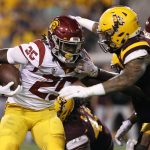 Southern California running back Ronald Jones II runs the ball as Arizona State's Jay Jay Wilson closes in to make the tackle during the first half of an NCAA college football game, Saturday, Oct. 28, 2017, in Tempe, Ariz. (AP Photo/Ralph Freso)