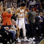 Phoenix Suns guard Devin Booker (1) celebrates as time expires during the second half of an NBA basketball game against the Sacramento Kings, Monday, Oct. 23, 2017, in Phoenix. The Suns won 117-115. (AP Photo/Matt York)