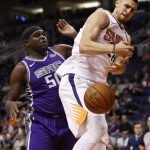 Phoenix Suns center Alex Len (21) loses the rebound as Sacramento Kings forward Zach Randolph (50) defends during the first half of an NBA basketball game, Monday, Oct. 23, 2017, in Phoenix. (AP Photo/Matt York)