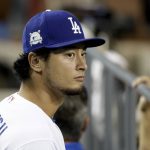 Los Angeles Dodgers pitcher Yu Darvish waits for Game 1 of the baseball team's National League Division Series against the Arizona Diamondbacks in Los Angeles, Friday, Oct. 6, 2017. (AP Photo/Jae C. Hong)