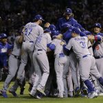 The Los Angeles Dodgers players celebrate after Game 5 of baseball's National League Championship Series against the Chicago Cubs, Thursday, Oct. 19, 2017, in Chicago. The Dodgers won 11-1 to win the series and advance to the World Series. (AP Photo/Nam Y. Huh)