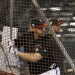 Arizona Diamondbacks right fielder J.D. Martinez hits during a workout at Chase Field, Tuesday, Oct. 3, 2017, in Phoenix, as the team gets ready for a National League wild-card playoff baseball game. The Diamondbacks host the Colorado Rockies on Wednesday. (AP Photo/Matt York)