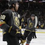 Vegas Golden Knights defenseman Brayden McNabb, right, celebrates after teammate left wing James Neal, left, scored during the first period of an NHL hockey game Tuesday, Oct. 10, 2017, in Las Vegas. (AP Photo/John Locher)