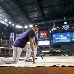 Colorado Rockies second baseman DJ LeMahieu waits to hit during batting practice for the National League wild-card playoff baseball game against the Arizona Diamondbacks, Wednesday, Oct. 4, 2017, in Phoenix. (AP Photo/Ross D. Franklin)