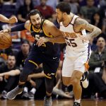 Utah Jazz guard Ricky Rubio (3) pushes the ball up court as Phoenix Suns guard Mike James (55) defends during the first half of an NBA basketball game, Wednesday, Oct. 25, 2017, in Phoenix. (AP Photo/Matt York)
