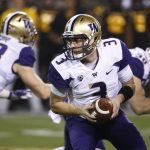 Washington quarterback Jake Browning (3) looks to hand the ball off during the first half of an NCAA college football game against Arizona State on Saturday, Oct. 14, 2017, in Tempe, Ariz. (AP Photo/Ross D. Franklin)