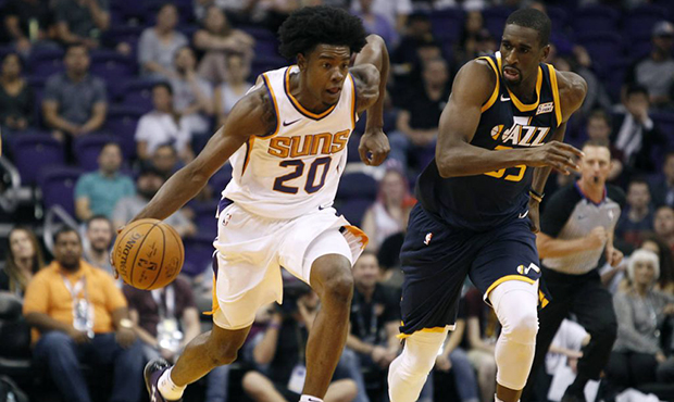 Phoenix Suns forward Josh Jackson (20) advances the ball up-court on a fast break as Utah Jazz forw...