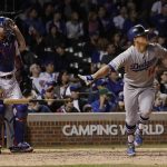 Los Angeles Dodgers' Enrique Hernandez (14) hits a home run off Chicago Cubs relief pitcher Mike Montgomery during the ninth inning of Game 5 of baseball's National League Championship Series, Thursday, Oct. 19, 2017, in Chicago. (AP Photo/Matt Slocum)