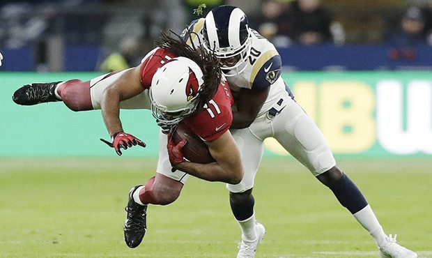 Arizona Cardinals wide receiver Larry Fitzgerald (11) is tackled by Los Angeles Rams free safety La...