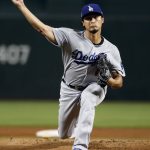 Los Angeles Dodgers starting pitcher Yu Darvish (21) throws against the Arizona Diamondbacks during the first inning of game 3 of baseball's National League Division Series, Monday, Oct. 9, 2017, in Phoenix. (AP Photo/Rick Scuteri)