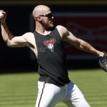 Arizona Diamondbacks catcher Chris Hermann throws during a workout for the National League wild card playoff baseball game, Tuesday, Oct. 3, 2017, in Phoenix. The Diamondbacks face the Colorado Rockies in a single game elimination playoff game on Wednesday. (AP Photo/Matt York)