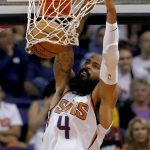 Phoenix Suns center Tyson Chandler dunks against the Los Angeles Lakers during the first half of an NBA basketball game, Friday, Oct. 20, 2017, in Phoenix. (AP Photo/Matt York)