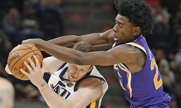 Phoenix Suns forward Josh Jackson, right, defends against Utah Jazz forward Joe Ingles, left, durin...