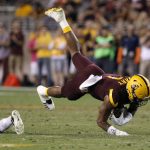 Arizona State wide receiver N'Keal Harry (1) is up-ended by Southern California defensive back Chris Hawkins after a reception during the second half of an NCAA college football game, Saturday, Oct. 28, 2017, in Tempe, Ariz. (AP Photo/Ralph Freso)