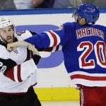 New York Rangers' Chris Kreider (20), right, punches Arizona Coyotes' Jason Demers during the third period of an NHL hockey game Thursday, Oct. 26, 2017, in New York. (AP Photo/Frank Franklin II)