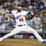 Los Angeles Dodgers relief pitcher Josh Fields throws against the Arizona Diamondbacks during the eighth inning of Game 2 of baseball's National League Division Series in Los Angeles, Saturday, Oct. 7, 2017. (AP Photo/Jae C. Hong)