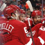 Detroit Red Wings center Dylan Larkin, second from right, celebrates his goal against the Arizona Coyotes in the second period of an NHL hockey game Tuesday, Oct. 31, 2017, in Detroit. (AP Photo/Paul Sancya)