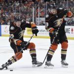 Anaheim Ducks right wing Ondrej Kase, left, shoots next to right wing Jakob Silfverberg during the second period of an NHL hockey game against the Arizona Coyotes in Anaheim, Calif., Thursday, Oct. 5, 2017. (AP Photo/Kelvin Kuo)