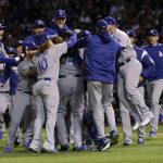 The Los Angeles Dodgers players celebrate after Game 5 of baseball's National League Championship Series against the Chicago Cubs, Thursday, Oct. 19, 2017, in Chicago. The Dodgers won 11-1 to win the series and advance to the World Series. (AP Photo/Nam Y. Huh)