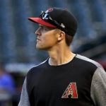 Arizona Diamondbacks starting pitcher Zack Greinke takes the field during a workout at Chase Field, Tuesday, Oct. 3, 2017, in Phoenix, as the team gets ready for a National League wild-card playoff baseball game. The Diamondbacks host the Colorado Rockies on Wednesday. (AP Photo/Matt York)