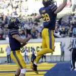California running back Patrick Laird (28) celebrates after scoring on a rushing touchdown against Arizona during the first half of an NCAA college football game Saturday, Oct. 21, 2017, in Berkeley, Calif. (AP Photo/Marcio Jose Sanchez)
