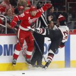 Detroit Red Wings defenseman Niklas Kronwall, of Sweden, (55) checks Arizona Coyotes center Nick Cousins (25) in the first period of an NHL hockey game Tuesday, Oct. 31, 2017, in Detroit. (AP Photo/Paul Sancya)