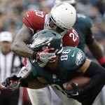 Philadelphia Eagles' Zach Ertz (86) is tackled by Arizona Cardinals' Deone Bucannon (20) during the second half of an NFL football game, Sunday, Oct. 8, 2017, in Philadelphia. (AP Photo/Matt Rourke)