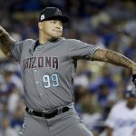 Arizona Diamondbacks stating pitcher Taijuan Walker throws to a Los Angeles Dodgers batter during first inning of Game 1 of a baseball National League Division Series in Los Angeles, Friday, Oct. 6, 2017. (AP Photo/Jae C. Hong)
