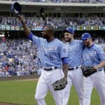 Veteran Kansas City Royals players Lorenzo Cain (6), Eric Hosmer (35) and Mike Moustakas (8) acknowledge the crowd as they come out of a baseball game during the fifth inning against the Arizona Diamondbacks, Sunday, Oct. 1, 2017, in Kansas City, Mo. (AP Photo/Charlie Riedel)