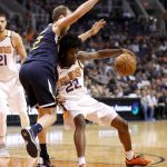 Phoenix Suns forward Josh Jackson (20) backs down Utah Jazz forward Joe Ingles during the second half of an NBA basketball game, Wednesday, Oct. 25, 2017, in Phoenix. The Suns won 97-88. (AP Photo/Matt York)