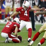 Arizona Cardinals kicker Phil Dawson (4) kicks a field goal against the San Francisco 49ers as punter Andy Lee (2) holds during the first half of an NFL football game, Sunday, Oct. 1, 2017, in Glendale, Ariz. (AP Photo/Ross D. Franklin)