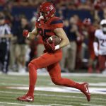 Arizona tight end Jamie Nunley scores a touchdown in the first half during an NCAA college football game against Washington State, Saturday, Oct. 28, 2017, in Tucson, Ariz. (AP Photo/Rick Scuteri)