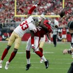 San Francisco 49ers cornerback Rashard Robinson (33) breaks up a pass intended for Arizona Cardinals wide receiver John Brown (12) during the first half of an NFL football game, Sunday, Oct. 1, 2017, in Glendale, Ariz. (AP Photo/Rick Scuteri)