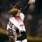 Arizona Diamondbacks relief pitcher Archie Bradley (25) throws against the Los Angeles Dodgers during the seventh inning of game 3 of baseball's National League Division Series, Monday, Oct. 9, 2017, in Phoenix. (AP Photo/Ross D. Franklin)