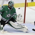 Dallas Stars goalie Ben Bishop (30) allows a goal by Arizona Coyotes defenseman Jason Demers, not shown, during the second period of an NHL hockey game in Dallas, Tuesday, Oct. 17, 2017. (AP Photo/LM Otero)