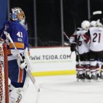 New York Islanders goalie Jaroslav Halak (41) reacts as the the Arizona Coyotes celebrate a goal by Anthony Duclair during the first period of an NHL hockey game Tuesday, Oct. 24, 2017, in New York. (AP Photo/Frank Franklin II)