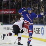 New York Rangers right wing Pavel Buchnevich (89) celebrates after scoring a goal as Arizona Coyotes' Alex Goligoski (33) skates away during the second period of an NHL hockey game Thursday, Oct. 26, 2017, in New York. (AP Photo/Frank Franklin II)