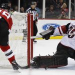 Arizona Coyotes goalie Louis Domingue makes a save on a shot by New Jersey Devils' Drew Stafford (18) during the second period of an NHL hockey game, Saturday, Oct. 28, 2017, in Newark, N.J. (AP Photo/Adam Hunger)