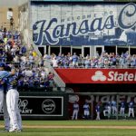 Veteran Kansas City Royals players Eric Hosmer, Lorenzo Cain, Mike Moustakas and Alcides Escobar gather in the infield before coming out of the game during the fifth inning of a baseball game against the Arizona Diamondbacks Sunday, Oct. 1, 2017, in Kansas City, Mo. (AP Photo/Charlie Riedel)