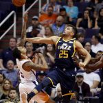 Phoenix Suns guard Tyler Ulis has his shot blocked by Utah Jazz guard Raul Neto (25) during the first half of an NBA basketball game, Wednesday, Oct. 25, 2017, in Phoenix. (AP Photo/Matt York)