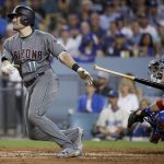 Arizona Diamondbacks' A.J. Pollock watches his home run against the Los Angeles Dodgers during the third inning of Game 1 of a baseball National League Division Series in Los Angeles, Friday, Oct. 6, 2017. (AP Photo/Jae C. Hong)