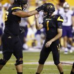 Arizona State's Brandon Ruiz (1) celebrates his field goal against Washington with offensive lineman Sam Jones (76) during the first half of an NCAA college football game, Saturday, Oct. 14, 2017, in Tempe, Ariz. (AP Photo/Ross D. Franklin)