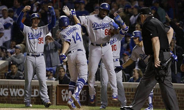 Los Angeles Dodgers' Enrique Hernandez (14) celebrates after hitting a grand slam during the third ...