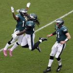 Philadelphia Eagles' Nelson Agholor, from left, LeGarrette Blount and Carson Wentz celebrate after Agholor's touchdown during the second half of an NFL football game against the Arizona Cardinals, Sunday, Oct. 8, 2017, in Philadelphia. (AP Photo/Michael Perez)