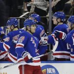 New York Rangers' Chris Kreider (20) celebrates with teammates after scoring a goal during the first period of an NHL hockey game against the Arizona Coyotes Thursday, Oct. 26, 2017, in New York. (AP Photo/Frank Franklin II)